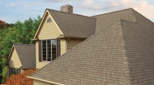 Close-up view of a shingle roofing system on a two-story home.