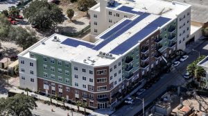 Commercial property with flat roofing installed.