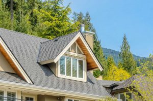 Two-story home with beautiful windows and a perfectly installed roofing system.